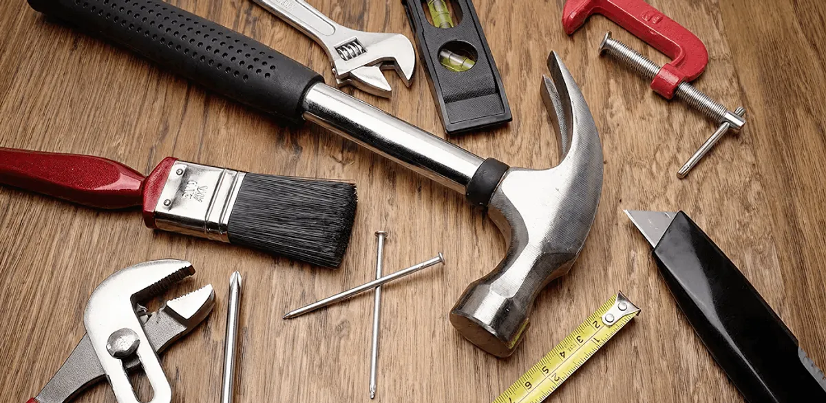 Handyman tools laid out for home repair and maintenance work in Staten Island, NY